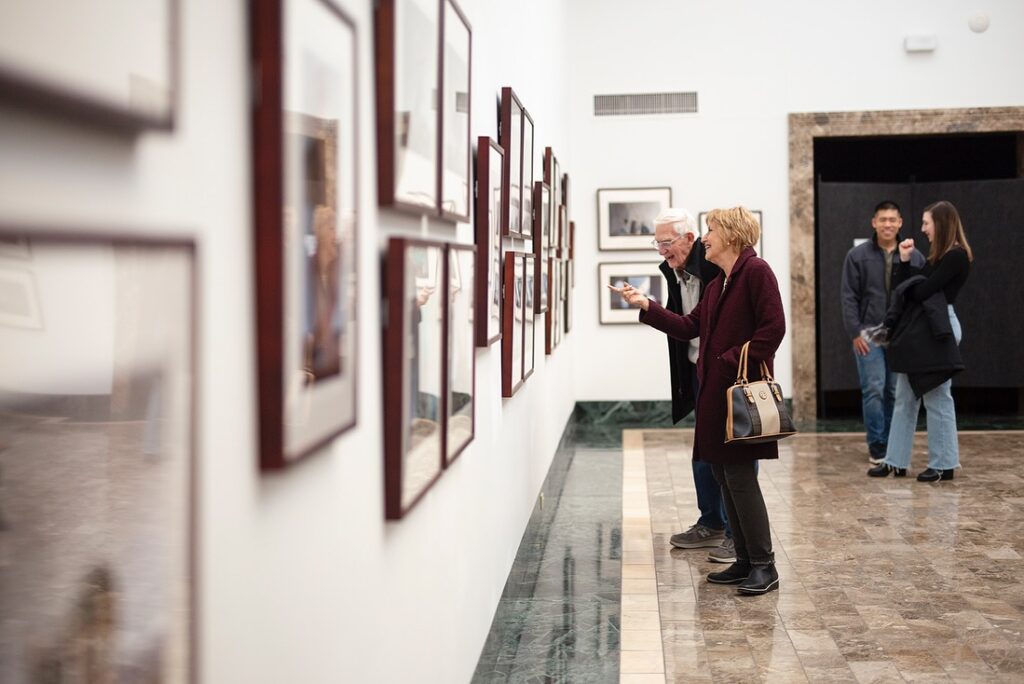 Two couples admiring a gallery at the Butler Institute of American Art.