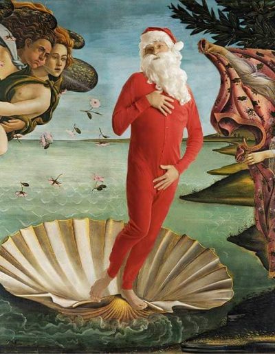 Santa dressed in an all-red onesie touching his chest and groin while standing in a seashell as someone is trying to cover him up as two angels fly by. This is a recreation of the painting 'The Birth of Venus' with Santa replacing Venus.