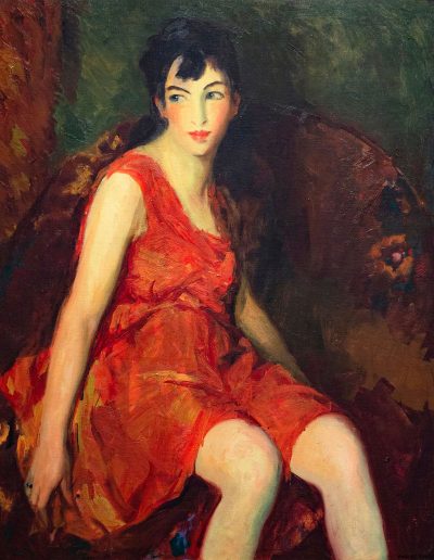 A woman wearing a short, sleeveless red dress sits in a red lounge chair and glances to the left side of the painting.